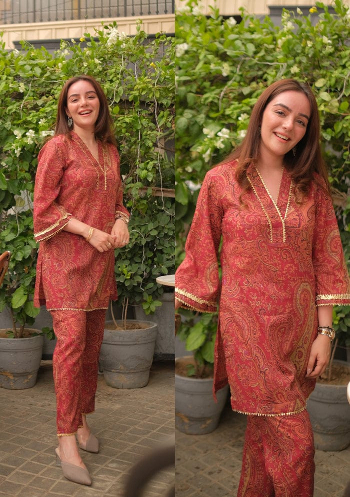 Rust Paisley Printed Kurta Set with Gold Lace Detailing