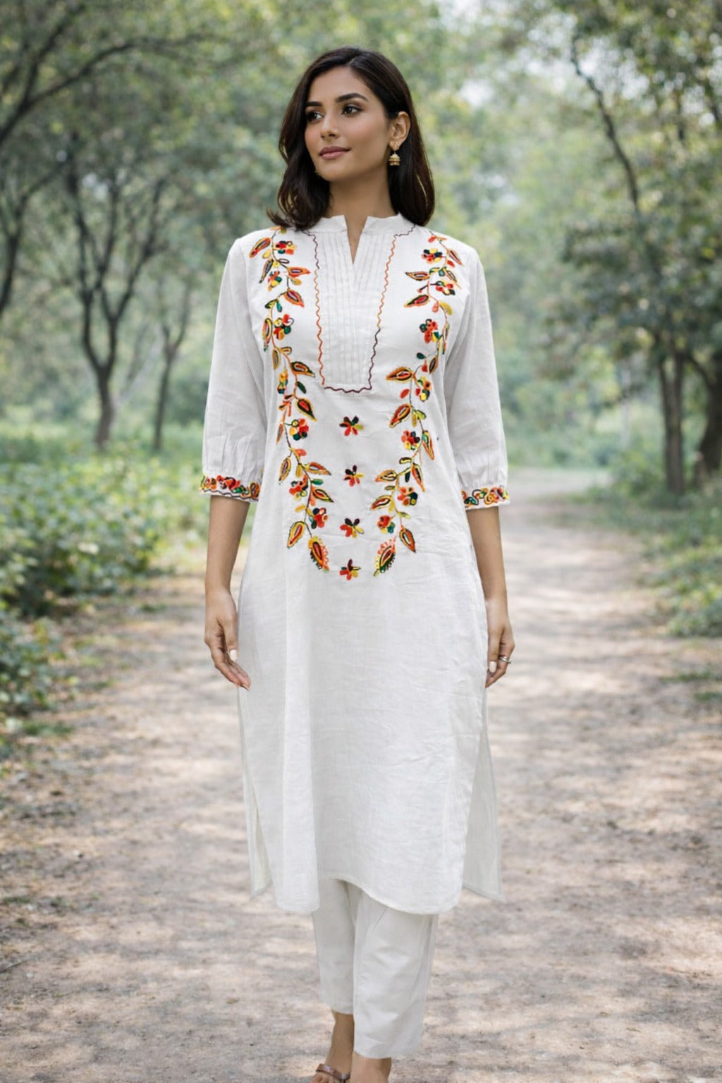 Elegant Off-White Cotton Straight Kurta Set with Colorful Floral Embroidery