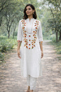 Elegant Off-White Cotton Straight Kurta Set with Colorful Floral Embroidery