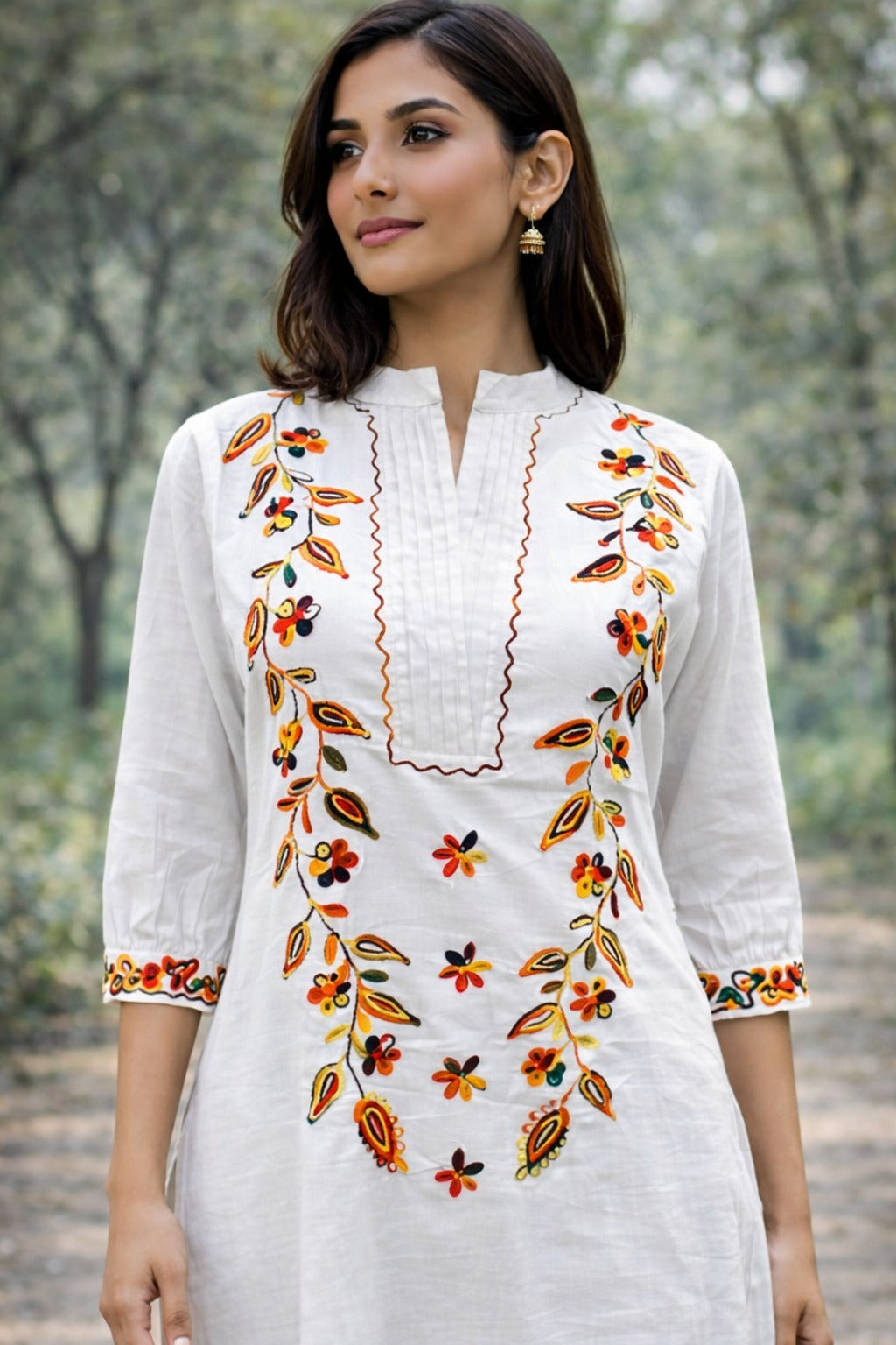 Elegant Off-White Cotton Straight Kurta Set with Colorful Floral Embroidery