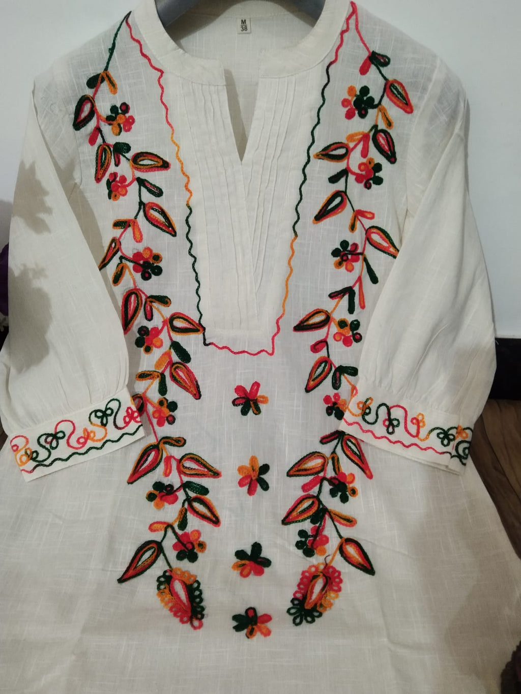 Elegant Off-White Cotton Straight Kurta Set with Colorful Floral Embroidery