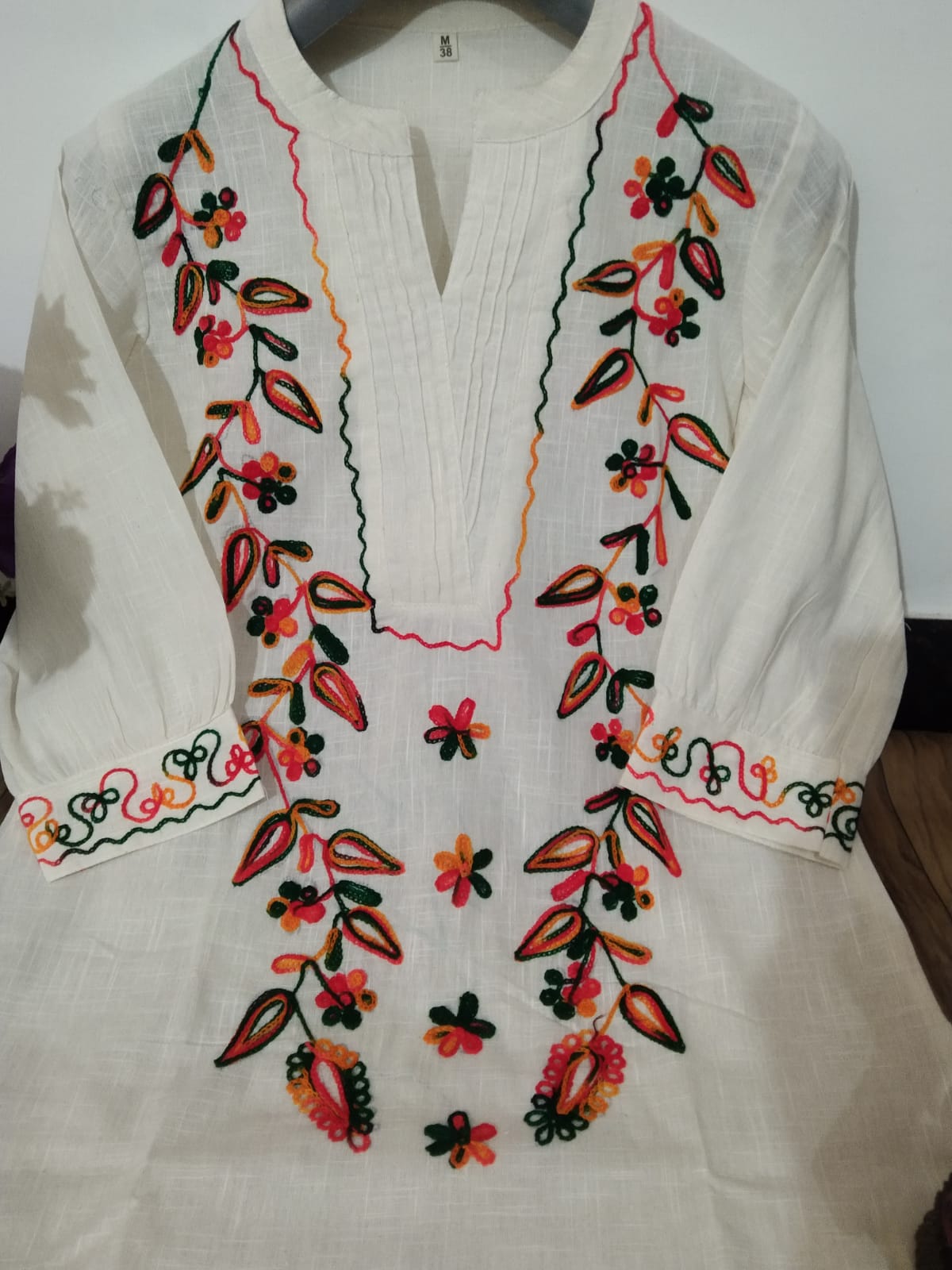 Elegant Off-White Cotton Straight Kurta Set with Colorful Floral Embroidery
