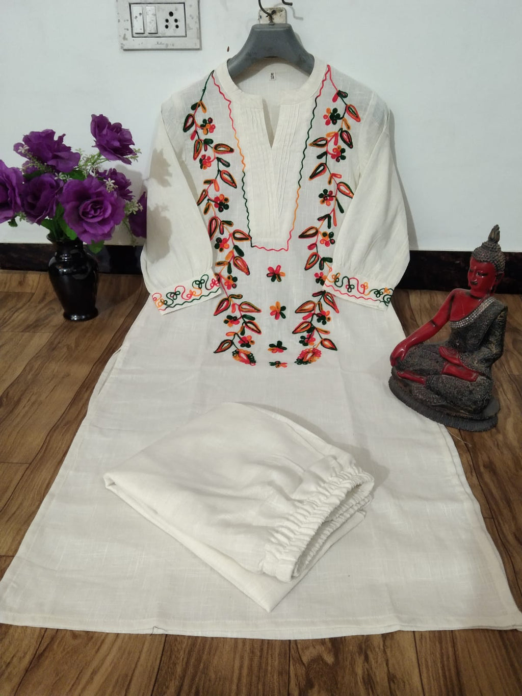 Elegant Off-White Cotton Straight Kurta Set with Colorful Floral Embroidery